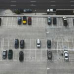 aerial view of cars parked on parking lot